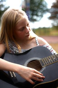 listening to music, guitar, girl, musical instrument, music, child, young, kid, artist, guitarist, play, classical guitar, acoustic guitar, string instrument, portrait